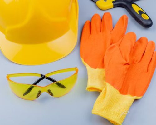 close-up-view-pattern-from-set-construction-tools-as-safety-glasses-safety-helmet-putty-knife-gloves